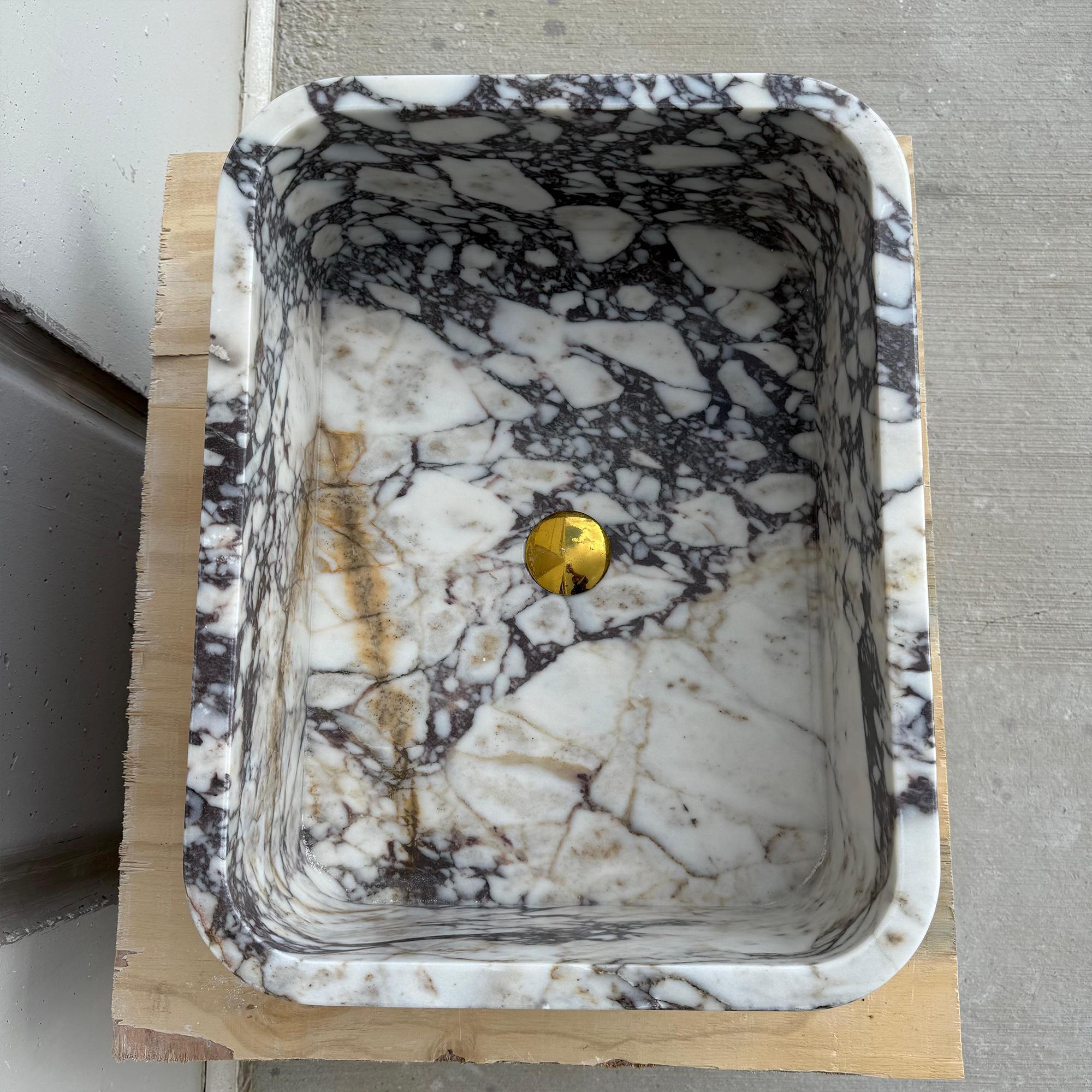High-end Italian marble sink with rounded square form