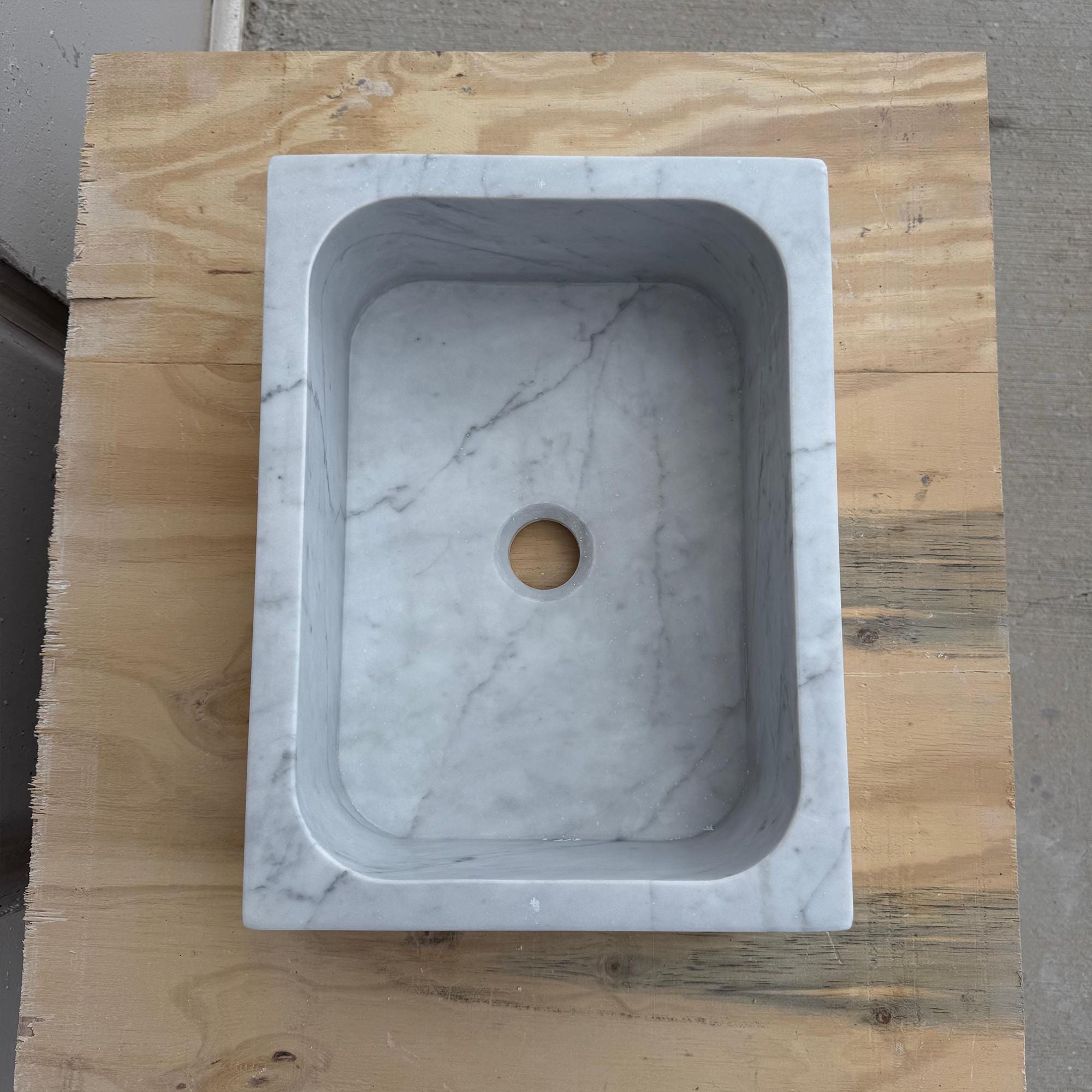 Modern rectangular stone sink in light gray tone