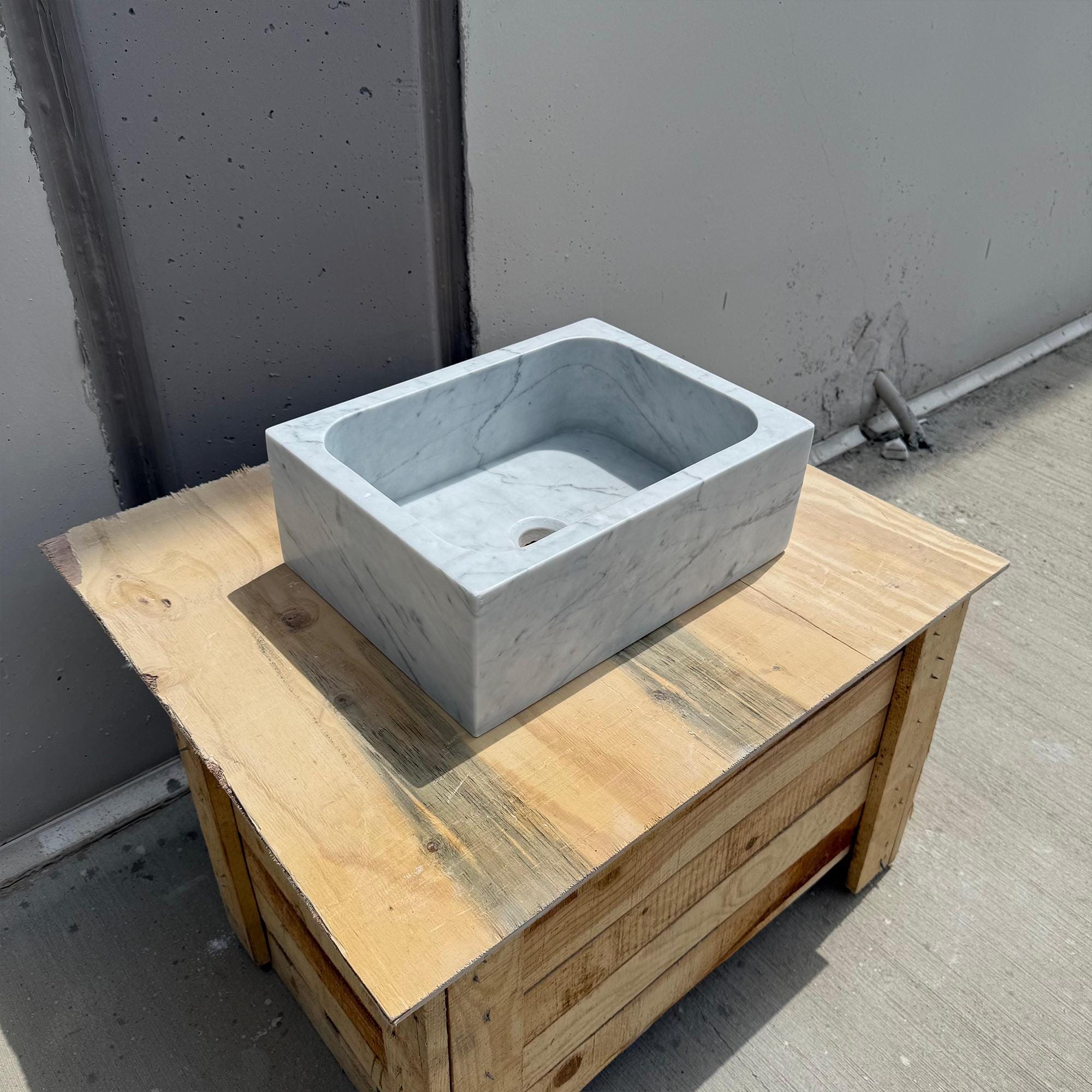Hand-finished marble sink for upscale bathrooms