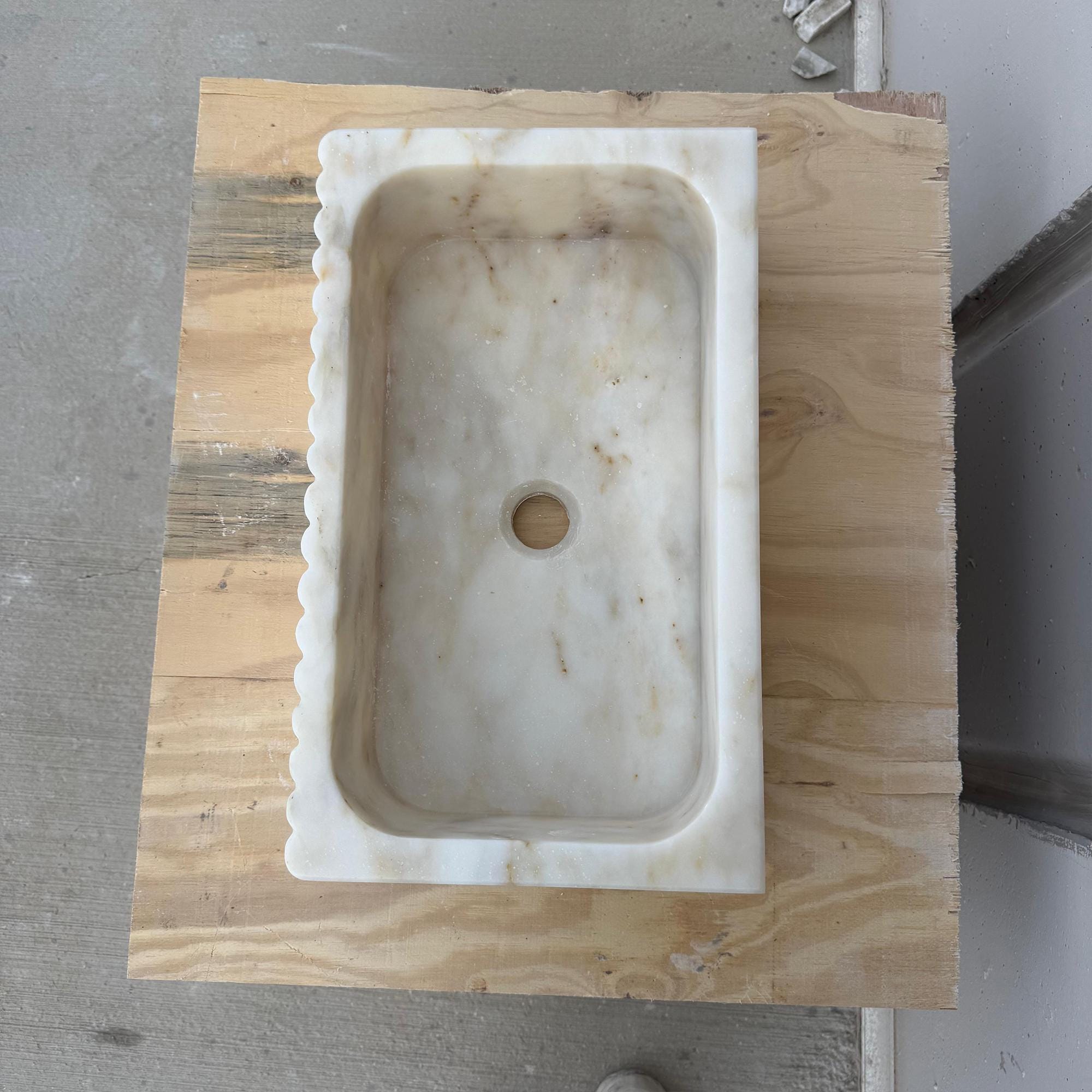 Fluted design marble sink for upscale bathroom vanities.