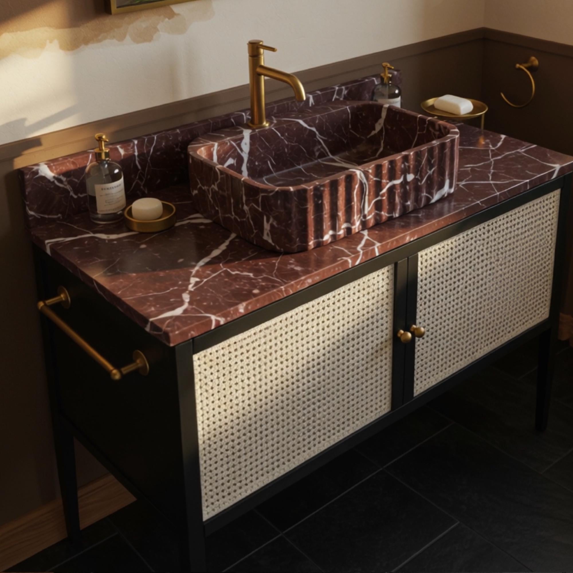 Luxurious red marble vanity set with gold accents