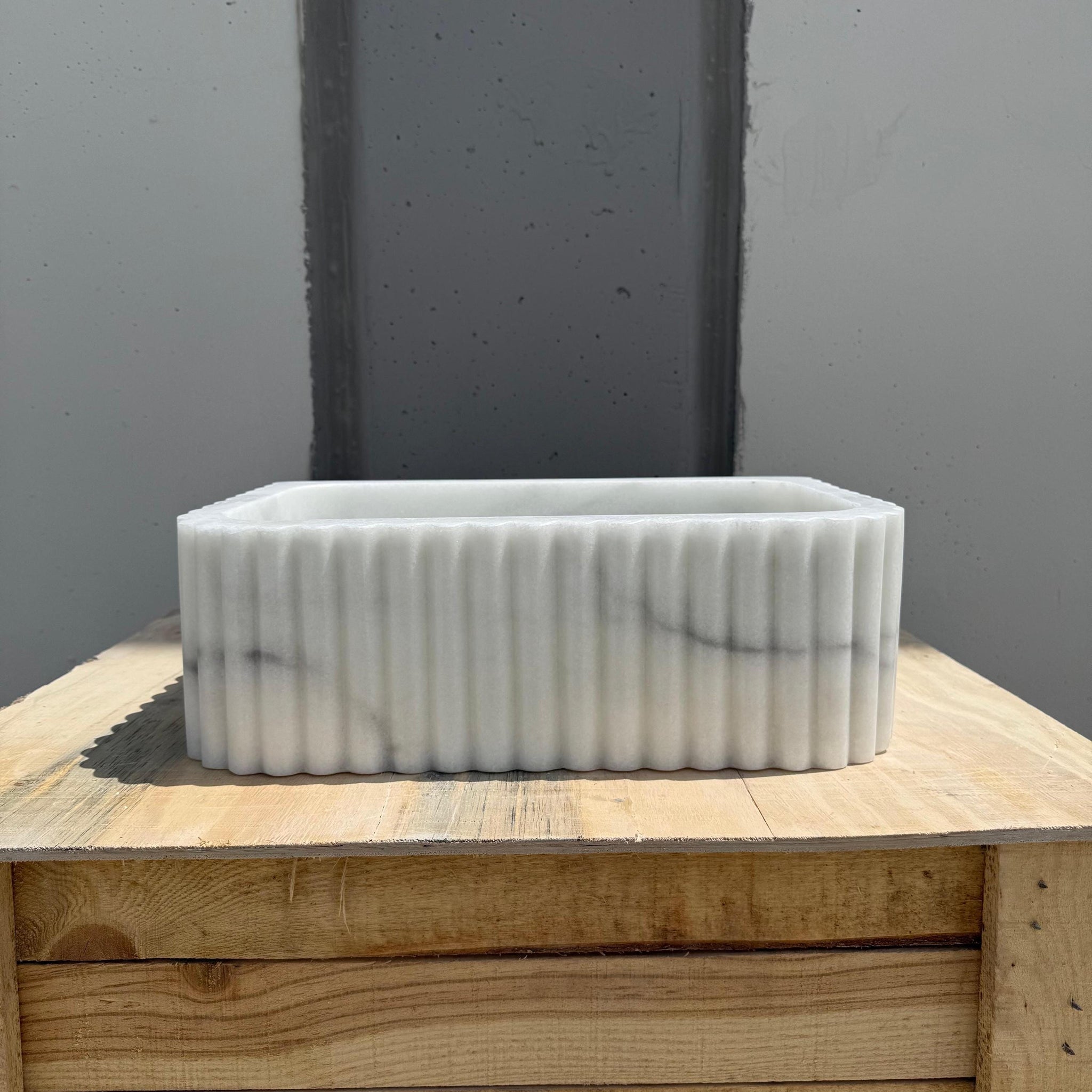 Luxury stone basin with sculptural design and premium finish