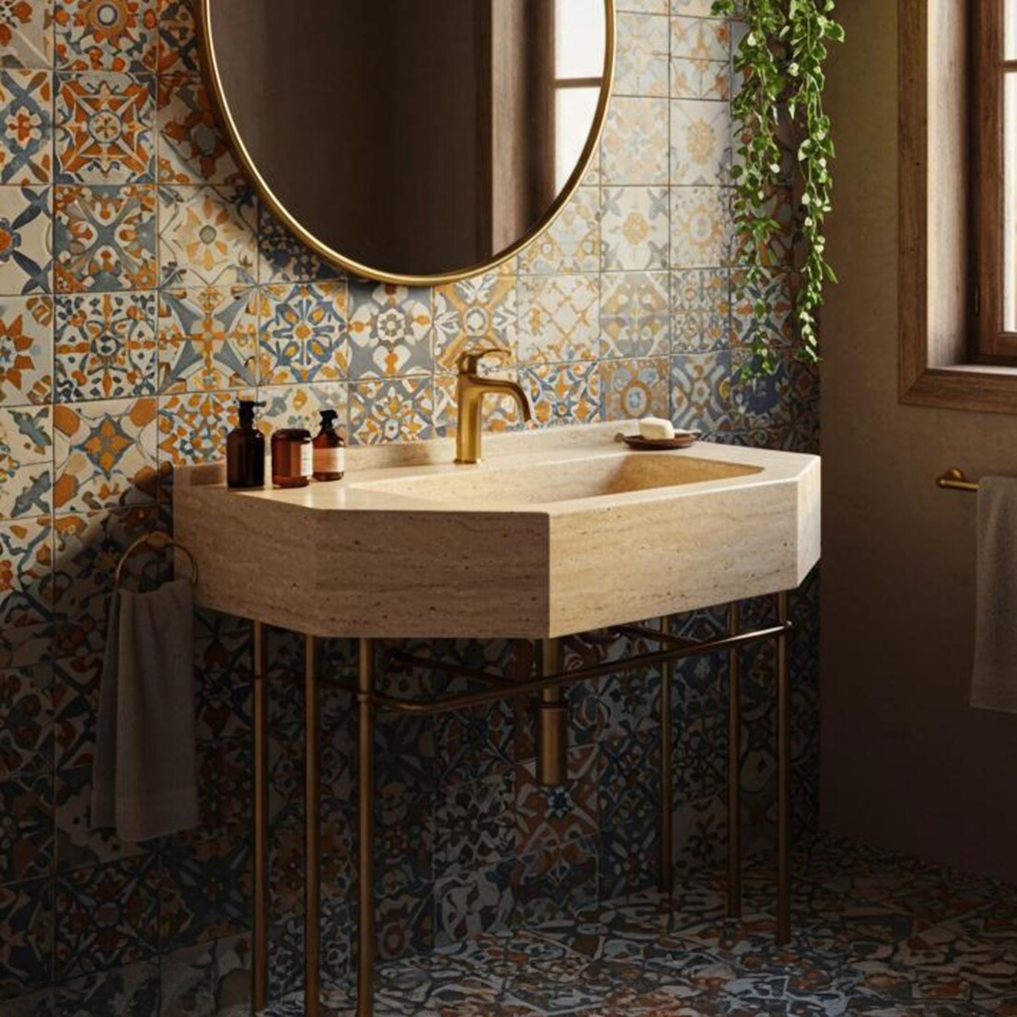 Rustic travertine bathroom sink with handcrafted stone and brass base