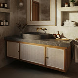 Silver Mist marble round vessel sink on dark gray countertop with rattan vanity