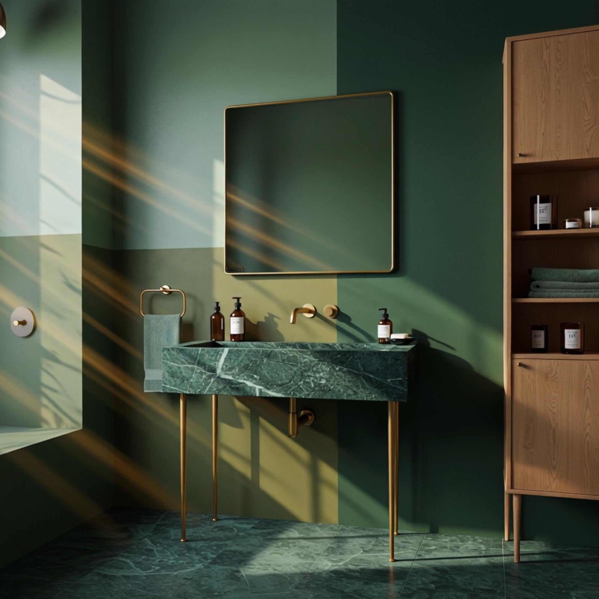 Minimalist green stone sink with gold fixtures